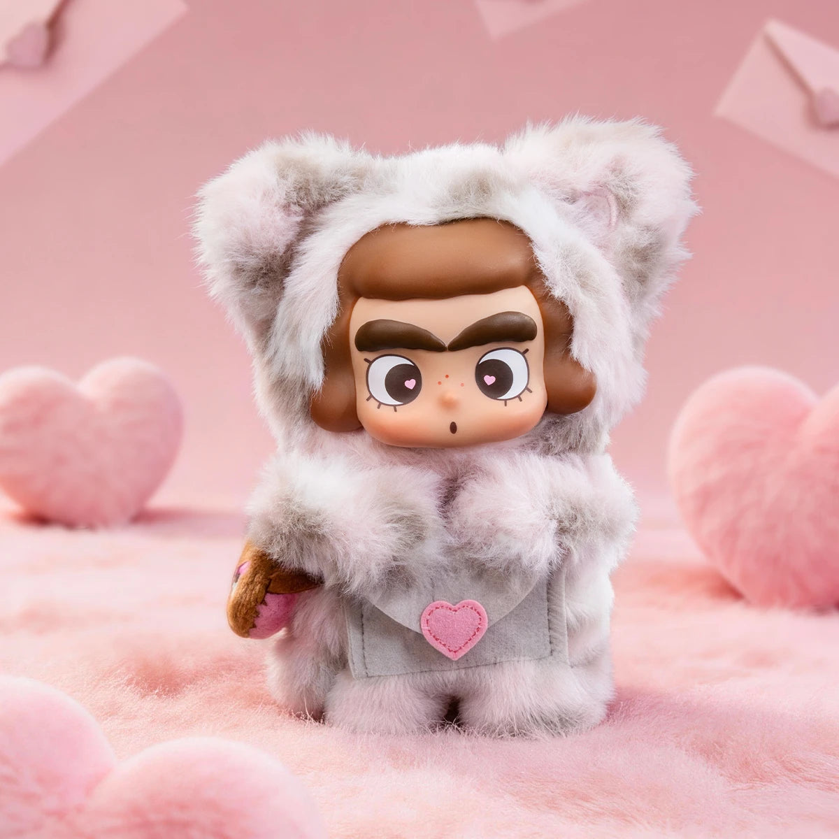 CiCiLu leopard-patterned messenger plush with thick brows on pink heart backdrop