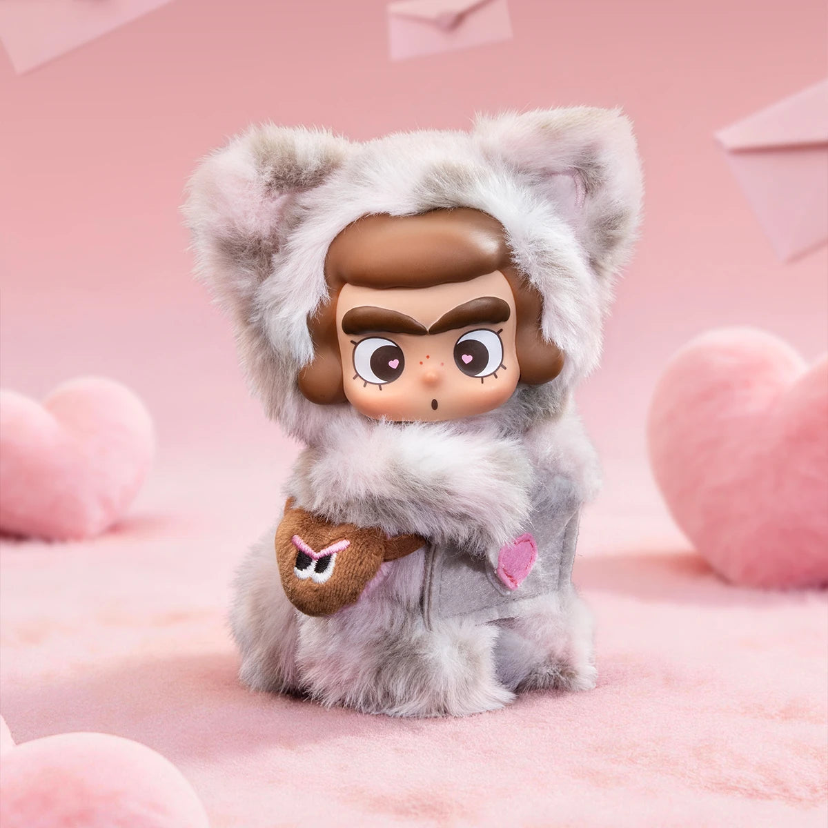 CiCiLu messenger plush with face-print satchel among pink hearts and envelopes