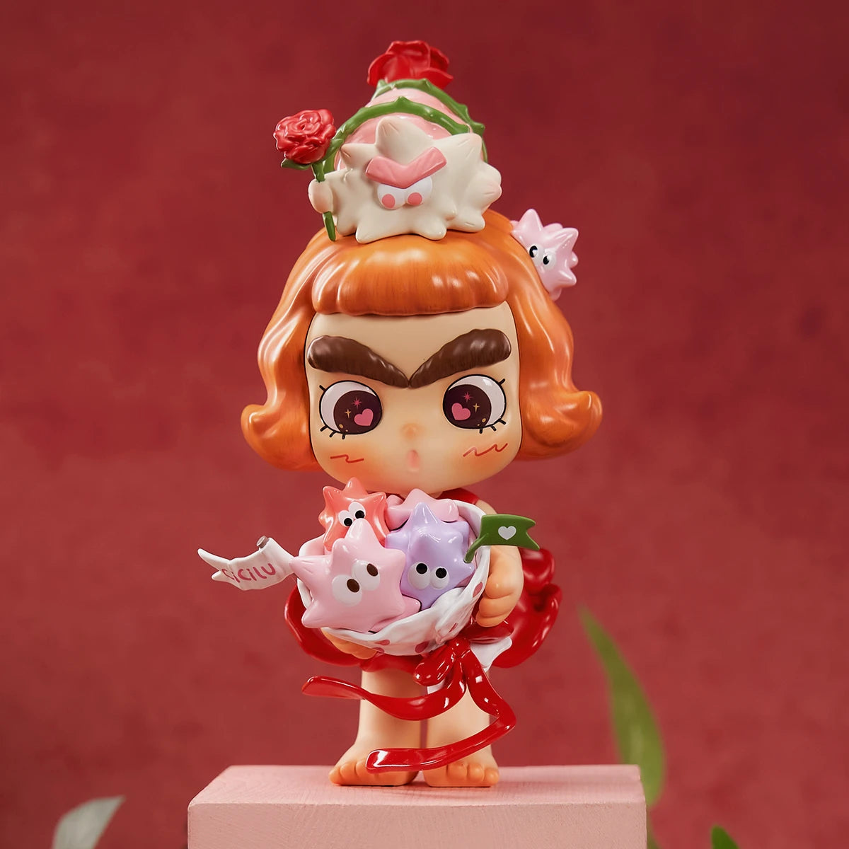 CiCiLu Urchin Oh My Love figure clutching a star urchin bouquet on rose backdrop