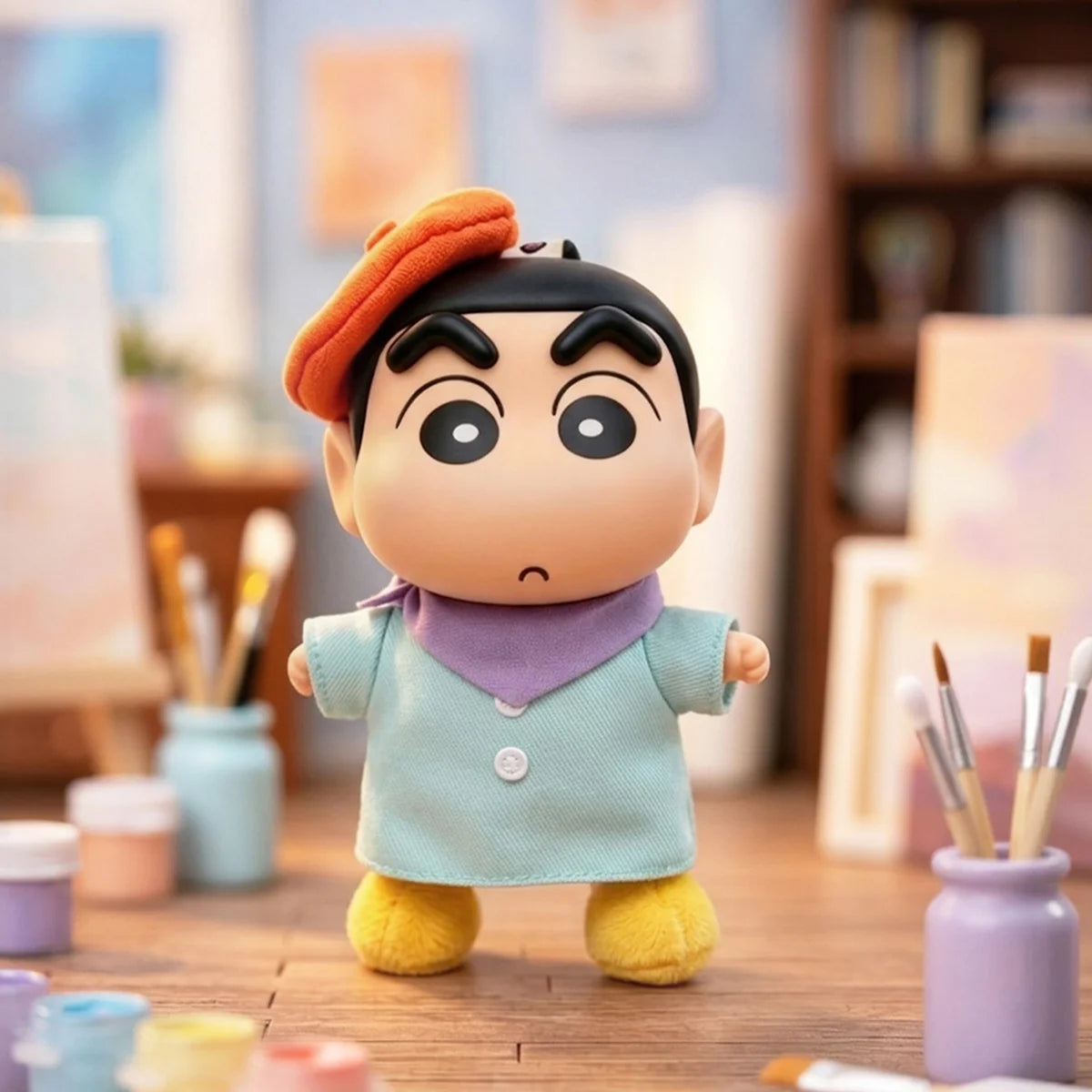 Shinnosuke Nohara plush wearing an orange beret, mint jacket, and purple scarf at an art desk