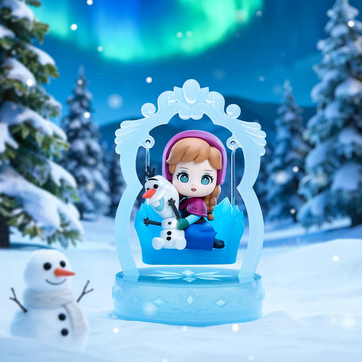 Anna & Olaf secret: Anna in pink hood hugging mini Olaf on a swing, Frozen Enchanted Swing