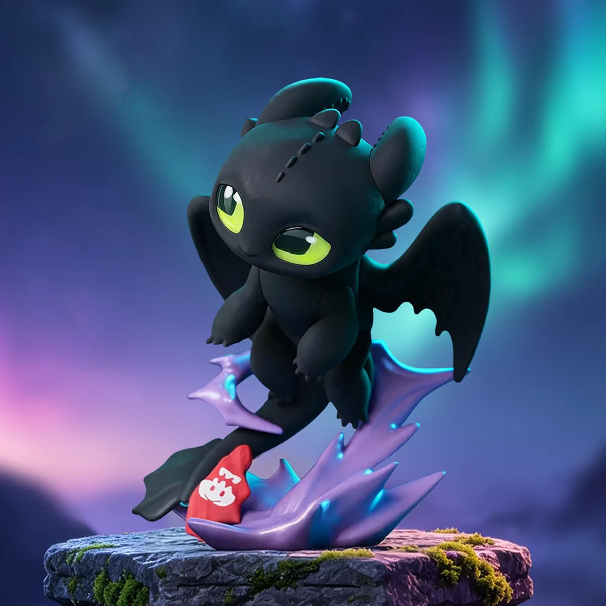 Toothless figure on an iridescent crystal base beneath northern lights from the Intertwined Light & Night Series by 52TOYS