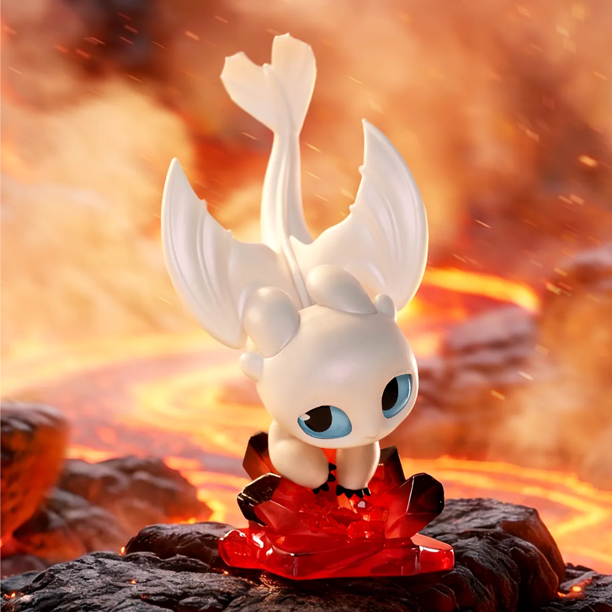 Light Fury figure on a red lava crystal base from the How to Train Your Dragon Intertwined Light & Night Series