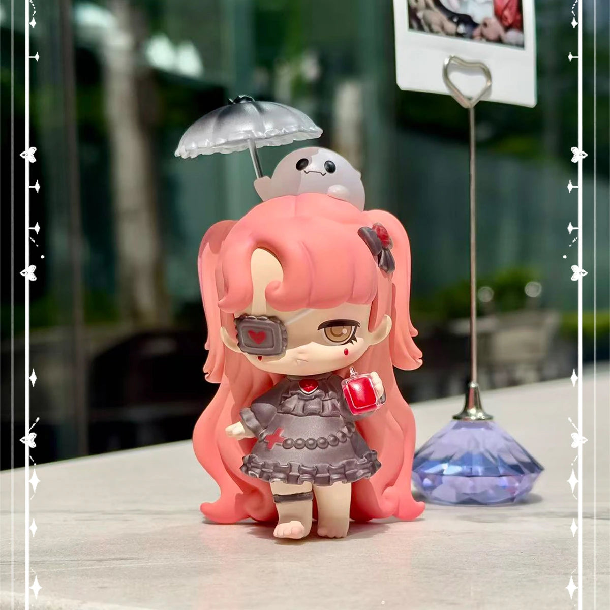 Pink-haired eyepatch Lilith in a gray dress holding a ghost-shaped photo umbrella