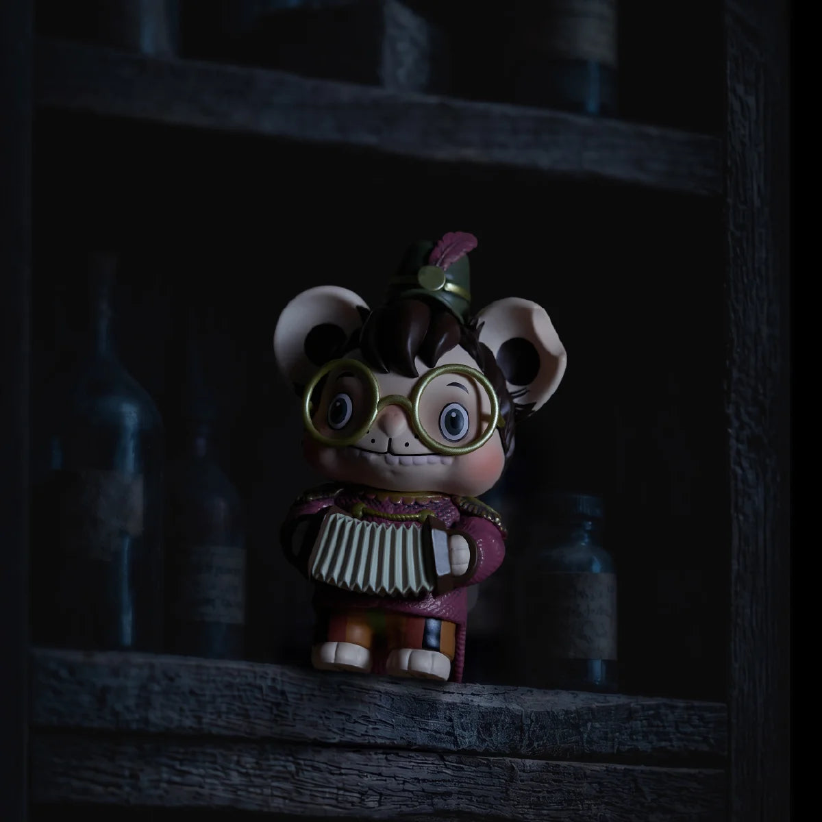 LITTLE BUNS The Conjuring Universe — Round-glasses bunny playing an accordion in a dark room