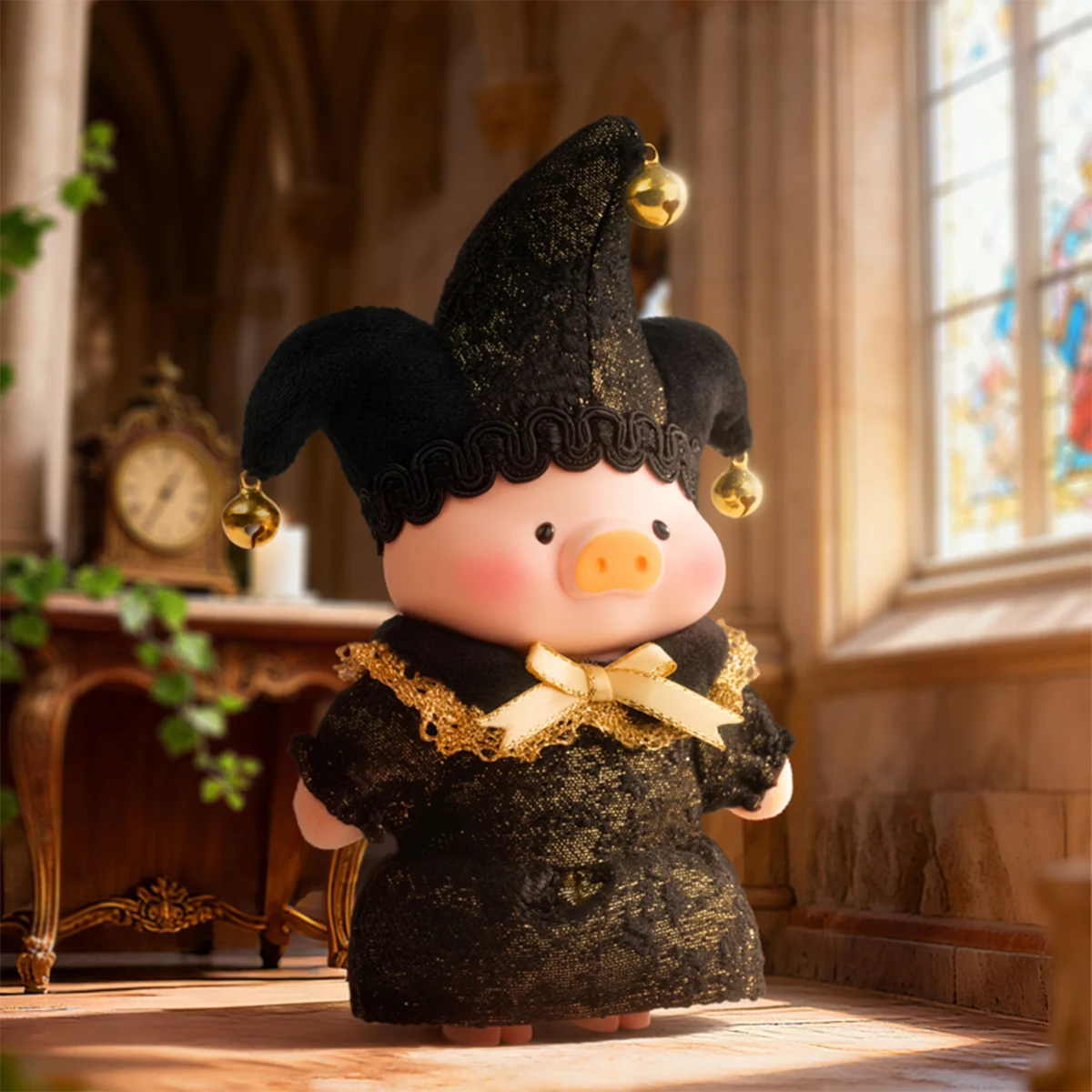 Infatuation Angel piggy in black jester hat with gold bow, Lulu The Piggy Triangel