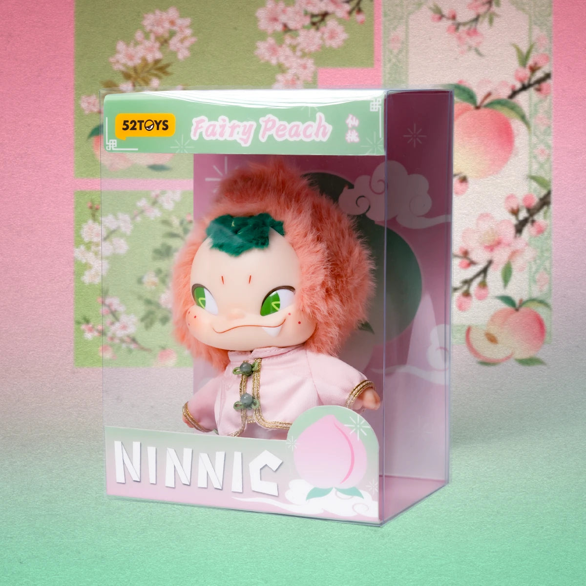 NINNIC Fairy Peach plush figure displayed inside its pink and green window box