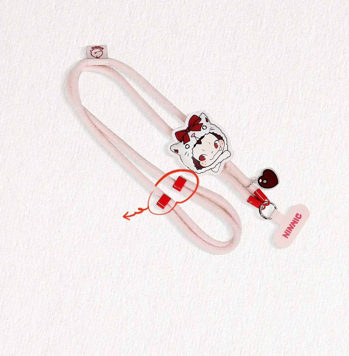 Party Kitty pink cord phone strap detail showing the adjustable slider beads, NINNIC Wild & Free blind box