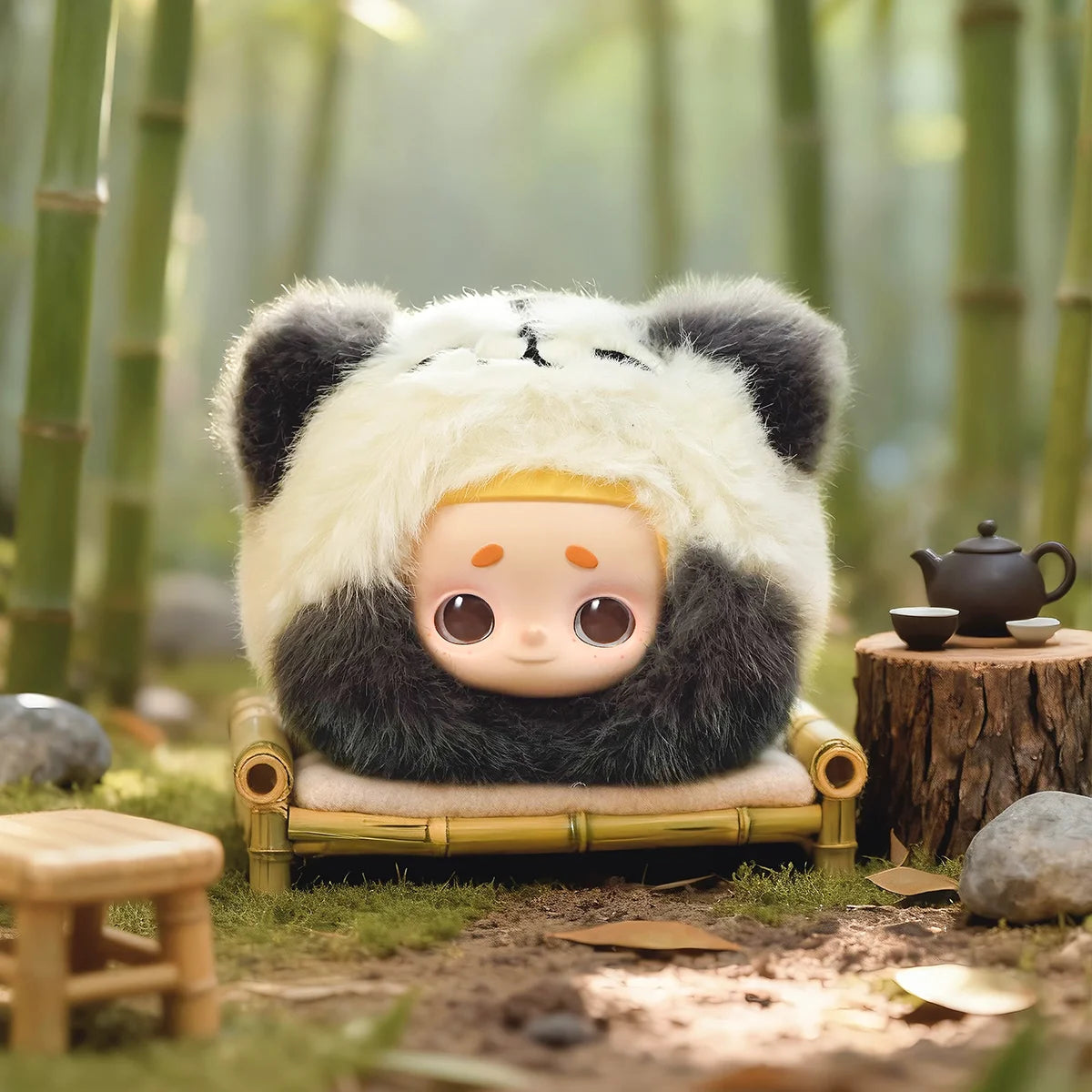 Lazy Panda Nook in a black-and-white panda hood resting on a bamboo bench, My Date with the Forest