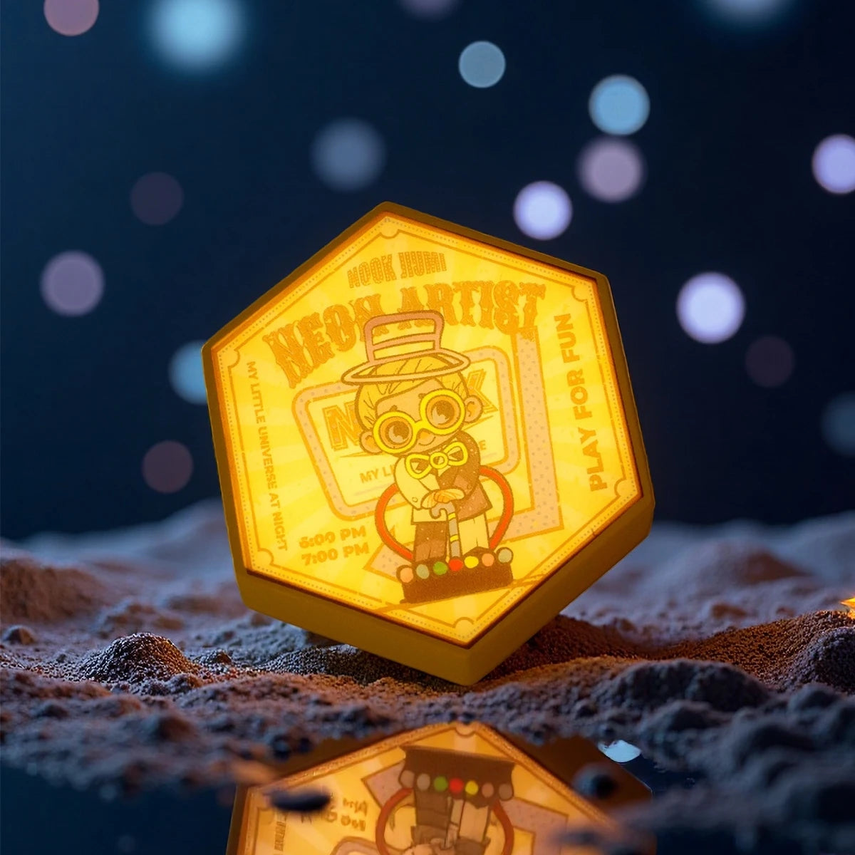 Neon Artist gold hexagonal magnet glowing with figure holding a neon sign, NOOK Night Series