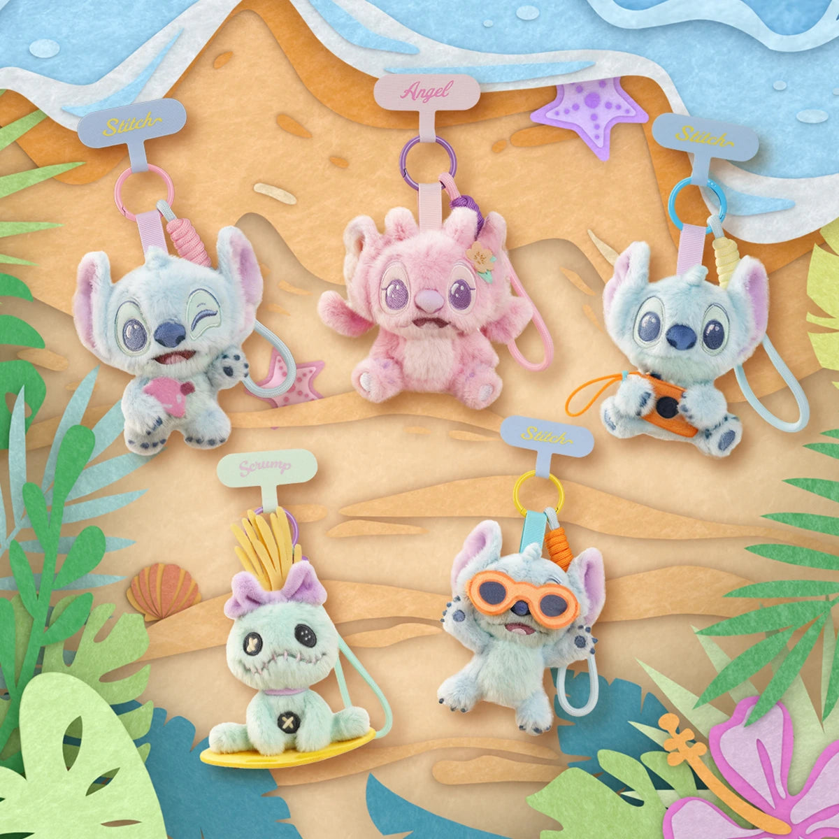 Five Stitch Aloha Hawaii plush phone straps arranged on an illustrated tropical beach