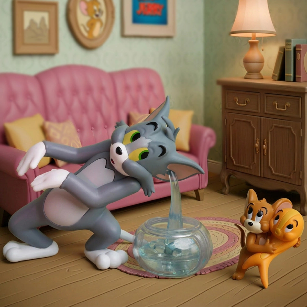 Tom leaning away from a glass fishbowl while Jerry and Tuffy watch in a living room