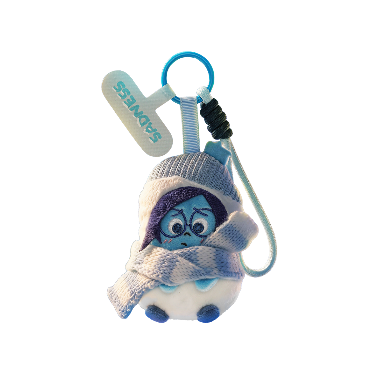 Sadness Winter Snow Globe plush phone charm shown on a black background