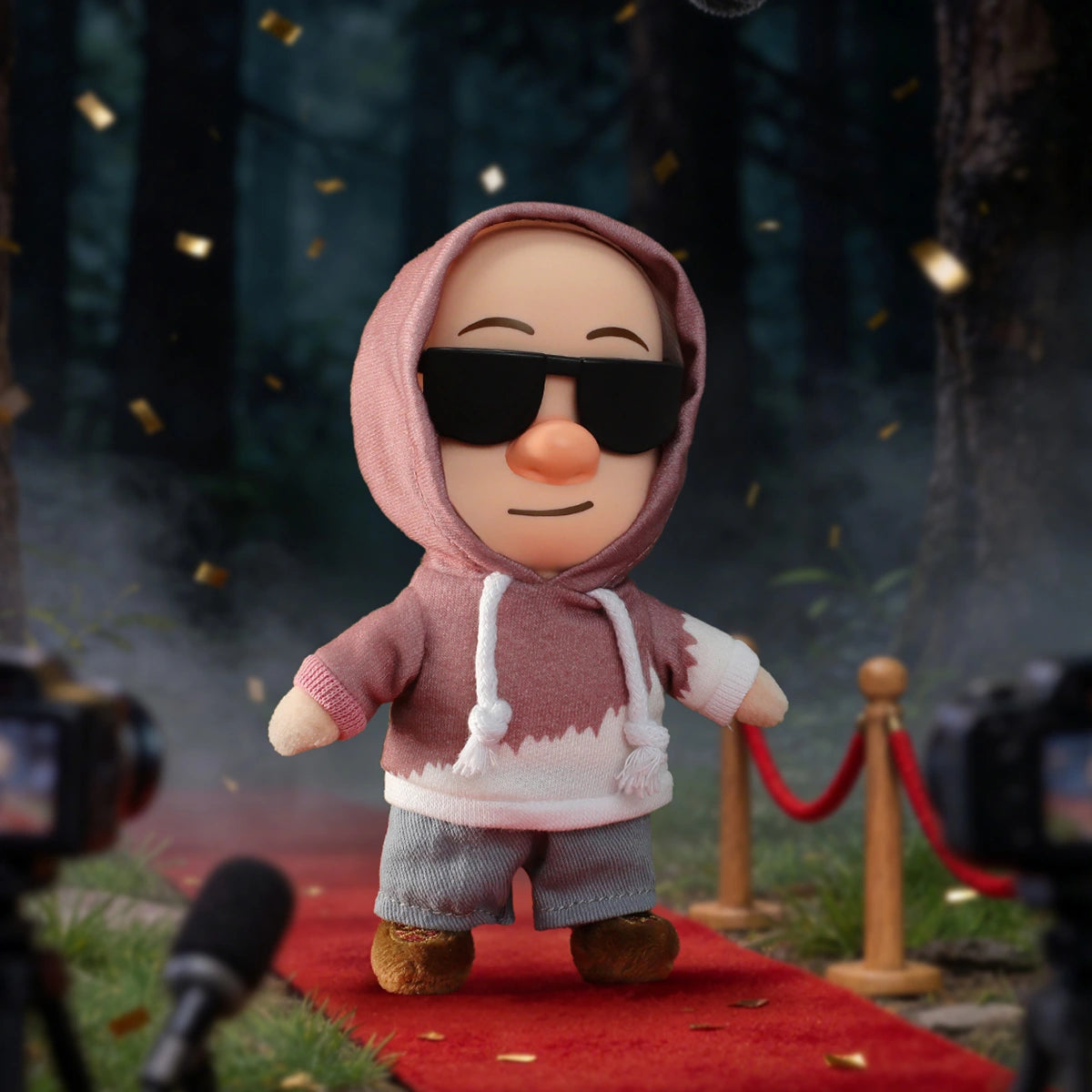 Fashion Week Director secret: human figure in pink hoodie and sunglasses on red carpet, Boonie Bears