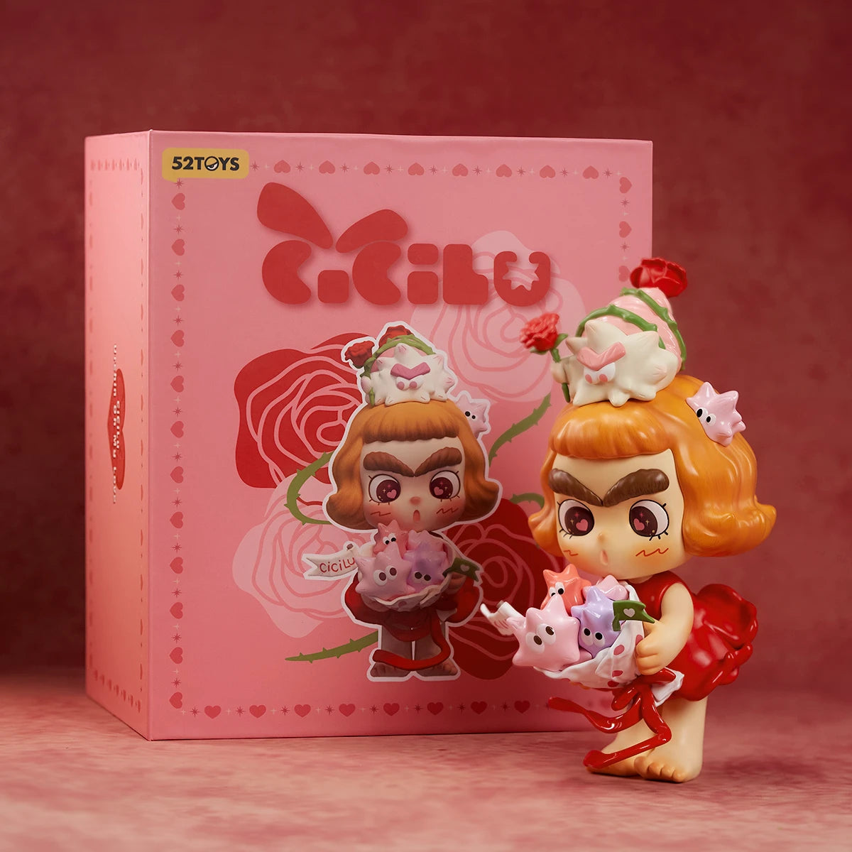 CiCiLu Urchin Oh My Love figure beside its pink rose-print blind box