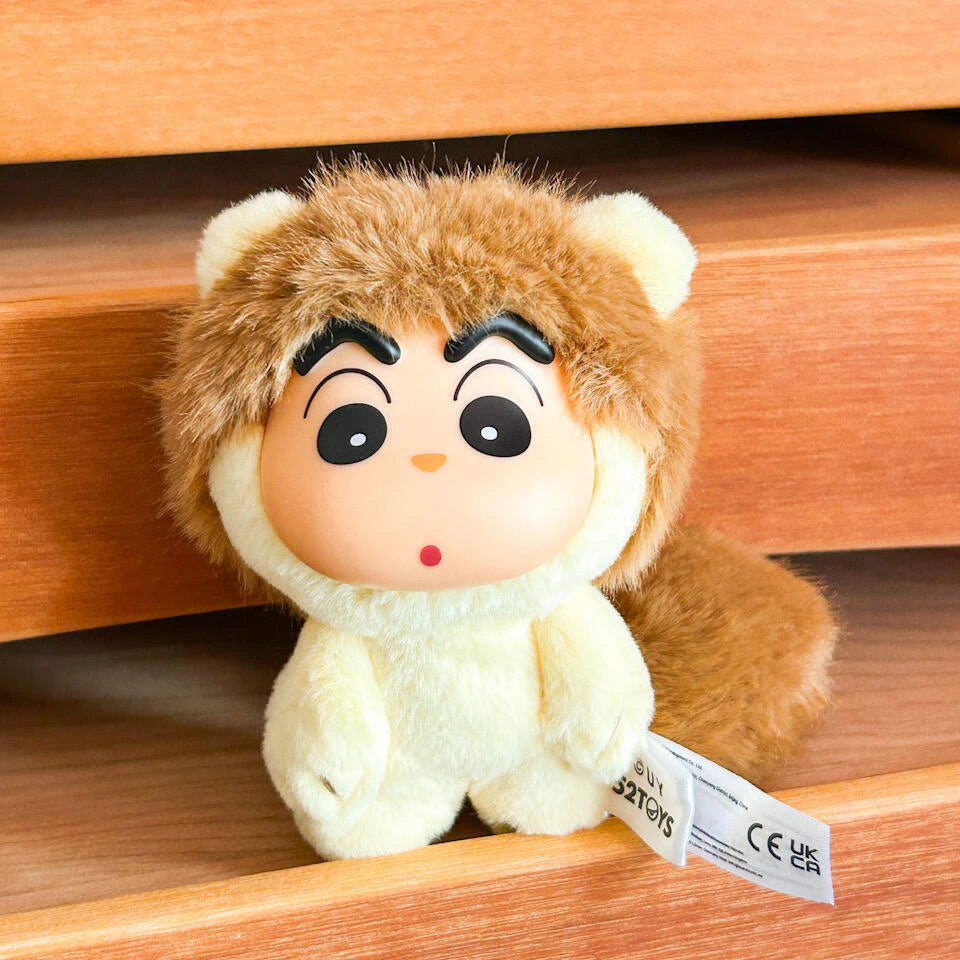 Cream squirrel-costume Shinchan Big Tails plush seated on a wooden shelf