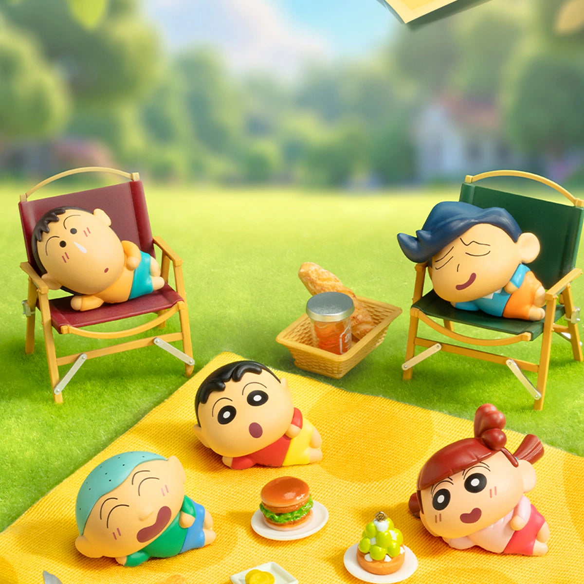 Crayon Shinchan MiniMe Lazy Chill figures napping at a sunny picnic scene