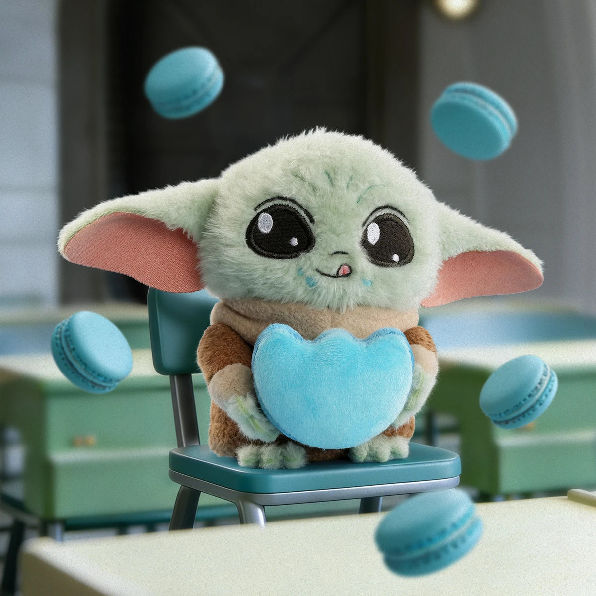 Grogu plush holding a blue heart while blue macarons float around a spaceship room