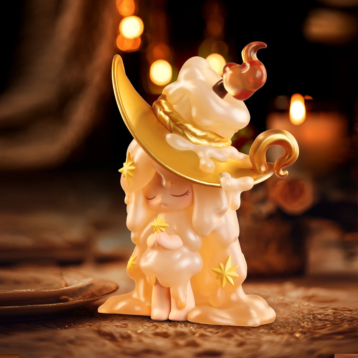 Laplly Candlelight Memories figure in golden crescent hat glowing in candlelight
