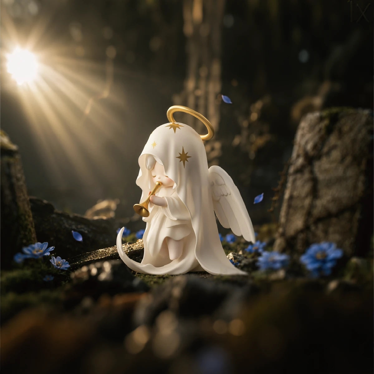 White angel Laplly figure with halo and crescent accessory in a sunlit forest