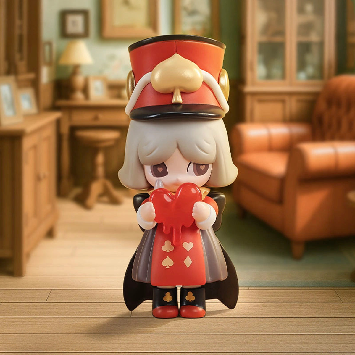 The Nutcracker Laplly in a tall red-and-gold spade hat holding a dripping red heart, Laplly Vintage Memory