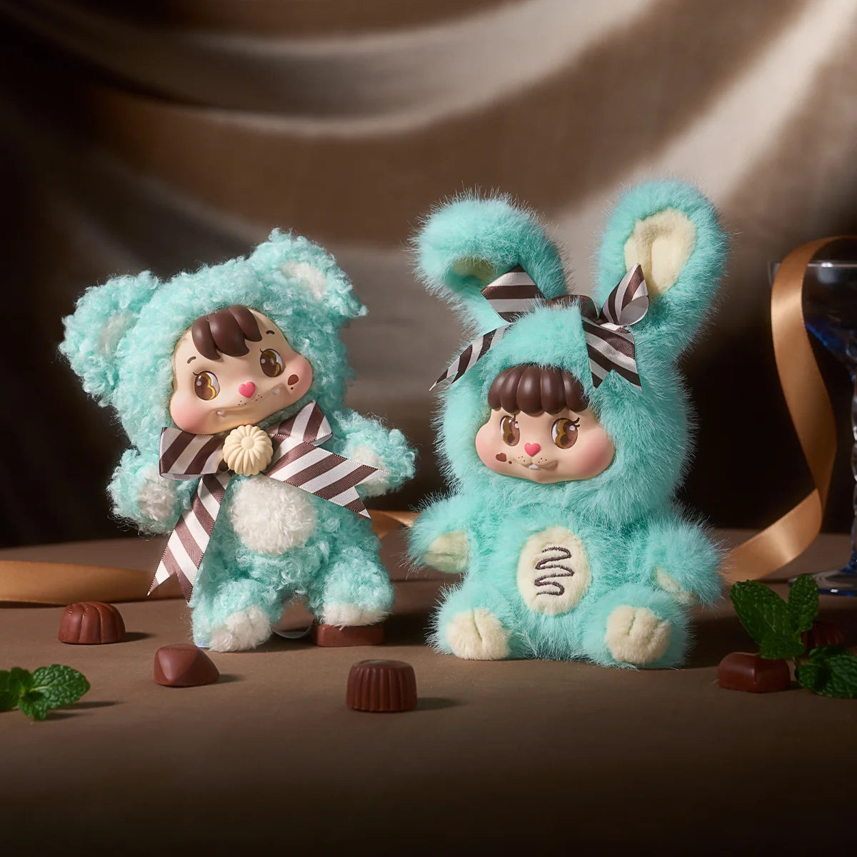 Mint Chocolate mint-green pair with striped scarves and cream paws, Little Buns Melting Together