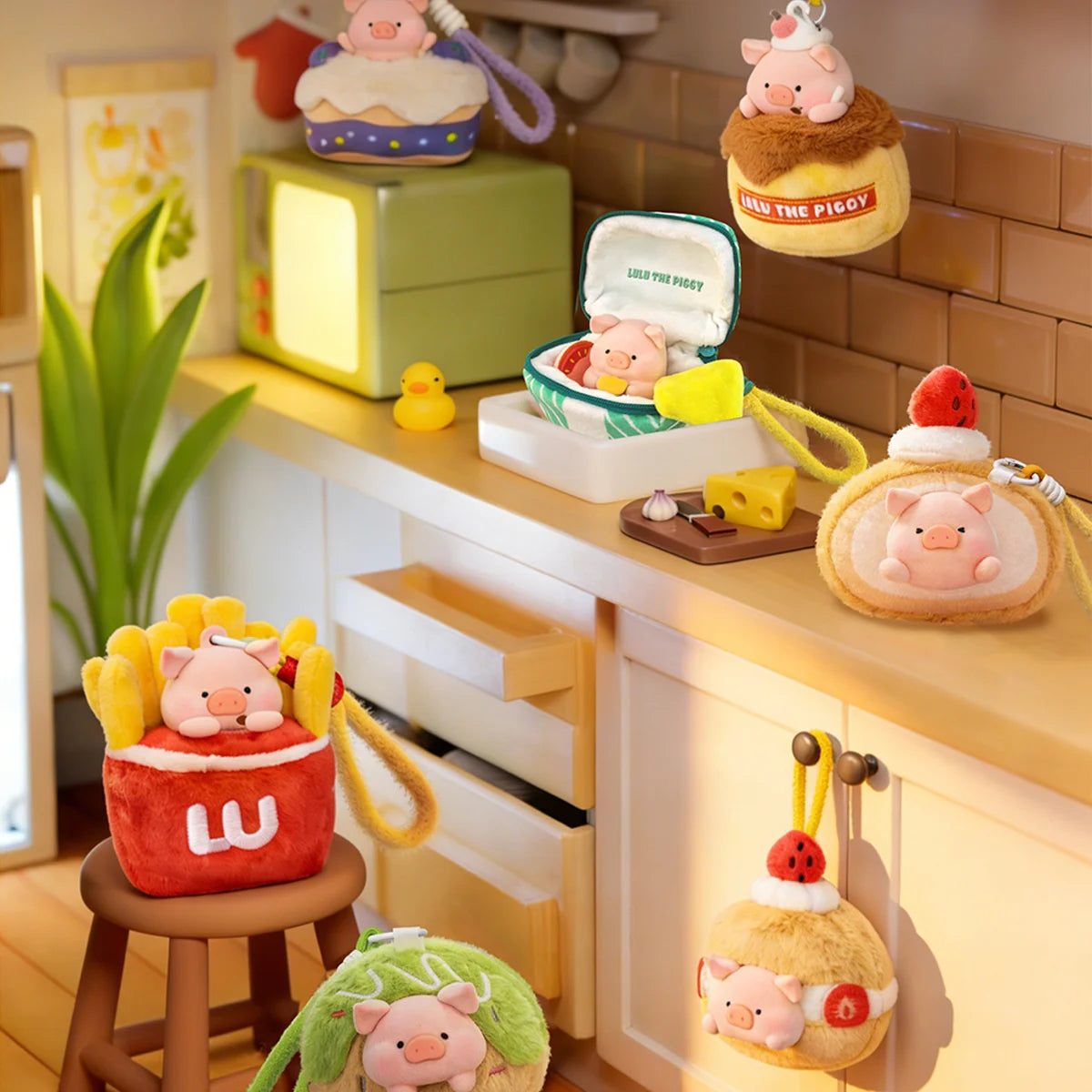 Pudding LULU pig atop a golden custard with caramel and a strawberry, Diet Nemesis plush keychain