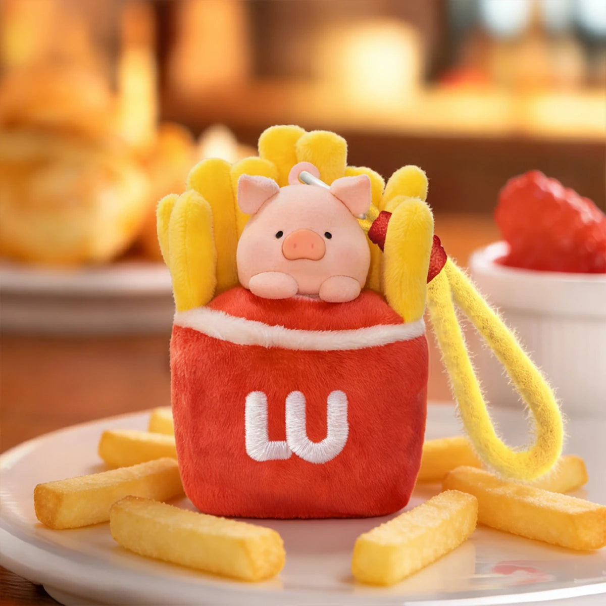 Secret Burger LULU pig nestled in a green bun case at a picnic, Diet Nemesis plush keychain
