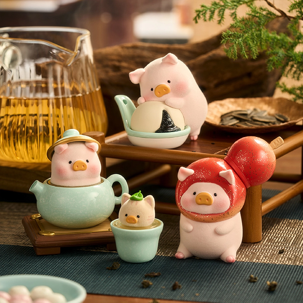 Lu's Table pigs styled as roast duck, tea and candied hawthorn dishes in a tea scene