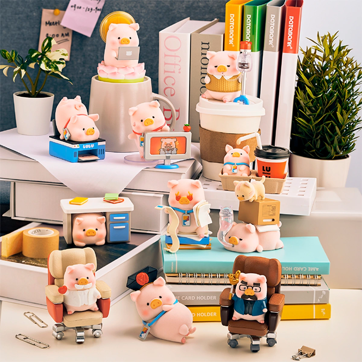 All LuLu Piggy Office figures arranged on books and shelves at a desk, workplace blind box