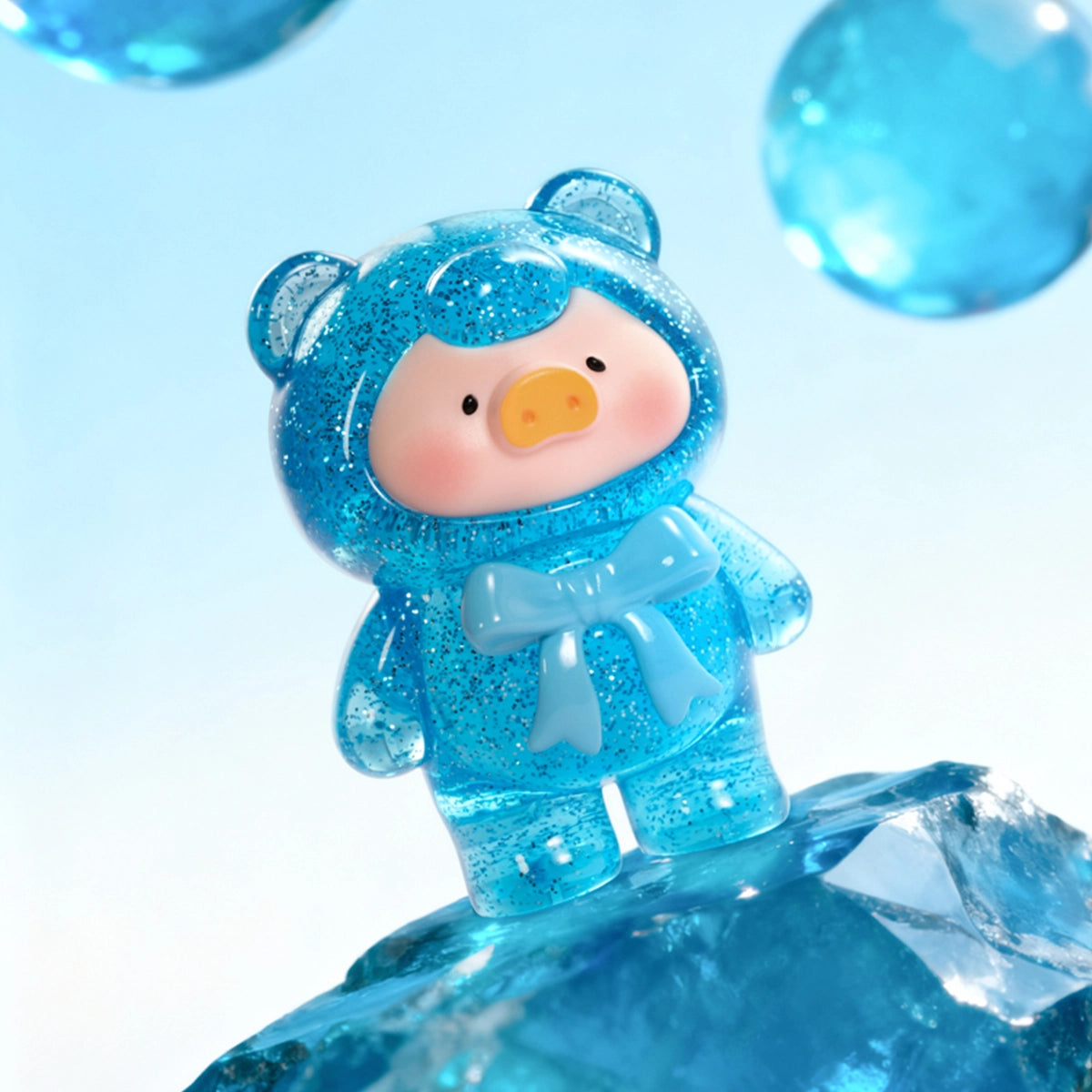 Aquamarine glittery light-blue translucent Lulu piggy figure on ice, Teddy Mini Ore Collection