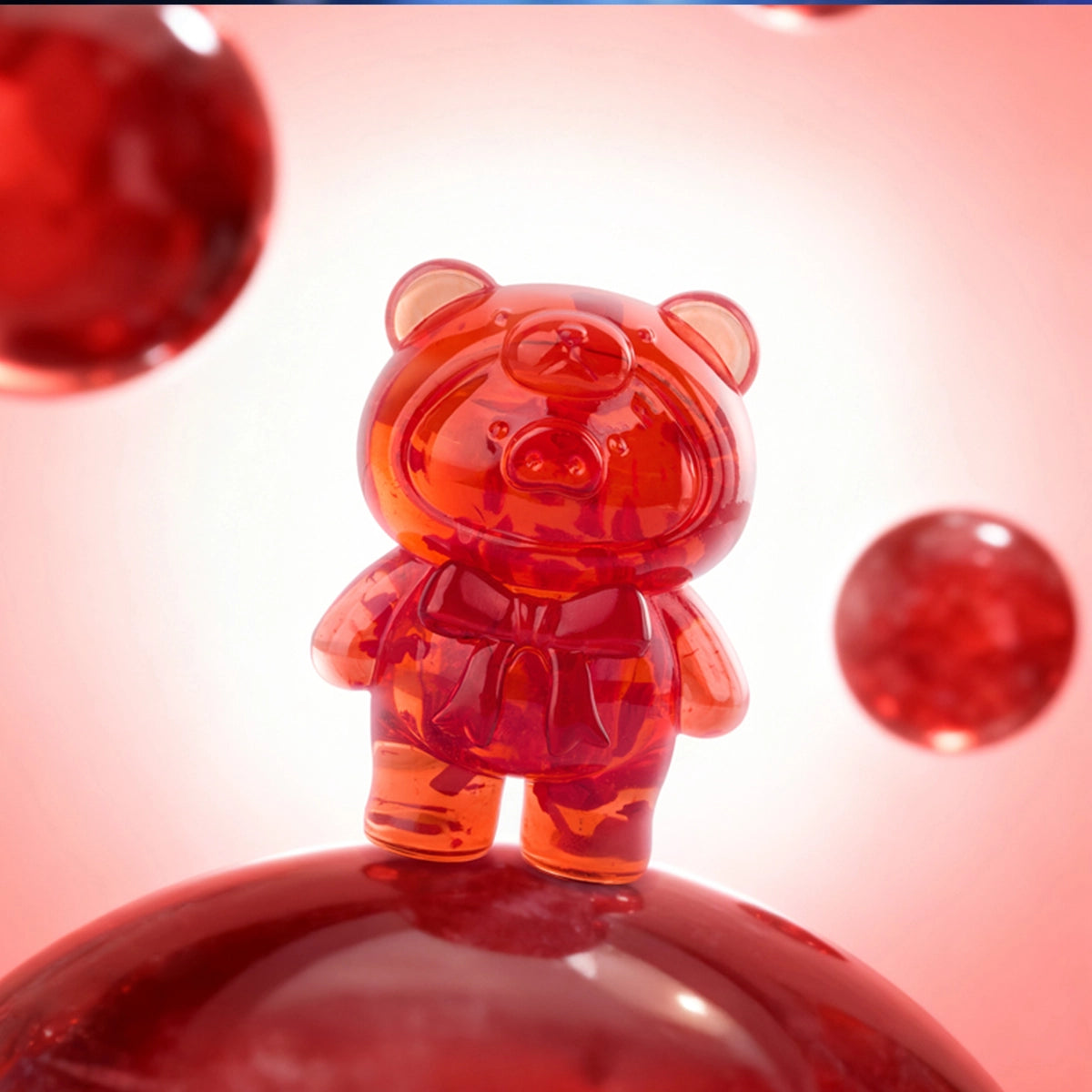 Red Super Seven translucent deep-red Lulu piggy figure on a red sphere, Teddy Mini Ore Collection