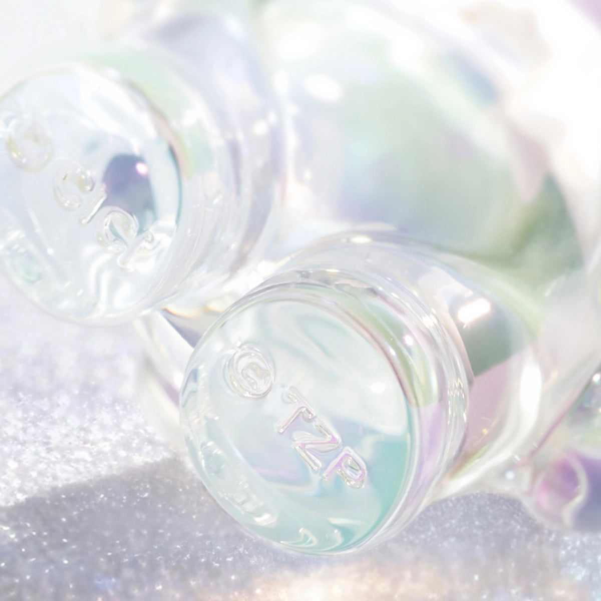 Close-up of clear Lulu piggy figure feet with embossed TZP logo, Teddy Mini Ore Collection