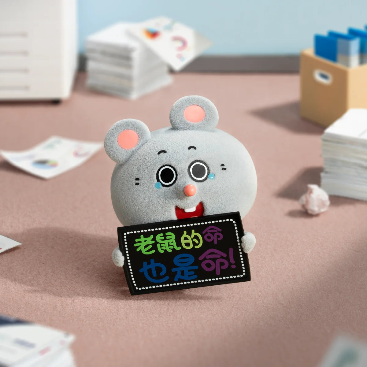 Meiji corporate mouse holding a sign with colorful Chinese office-life text
