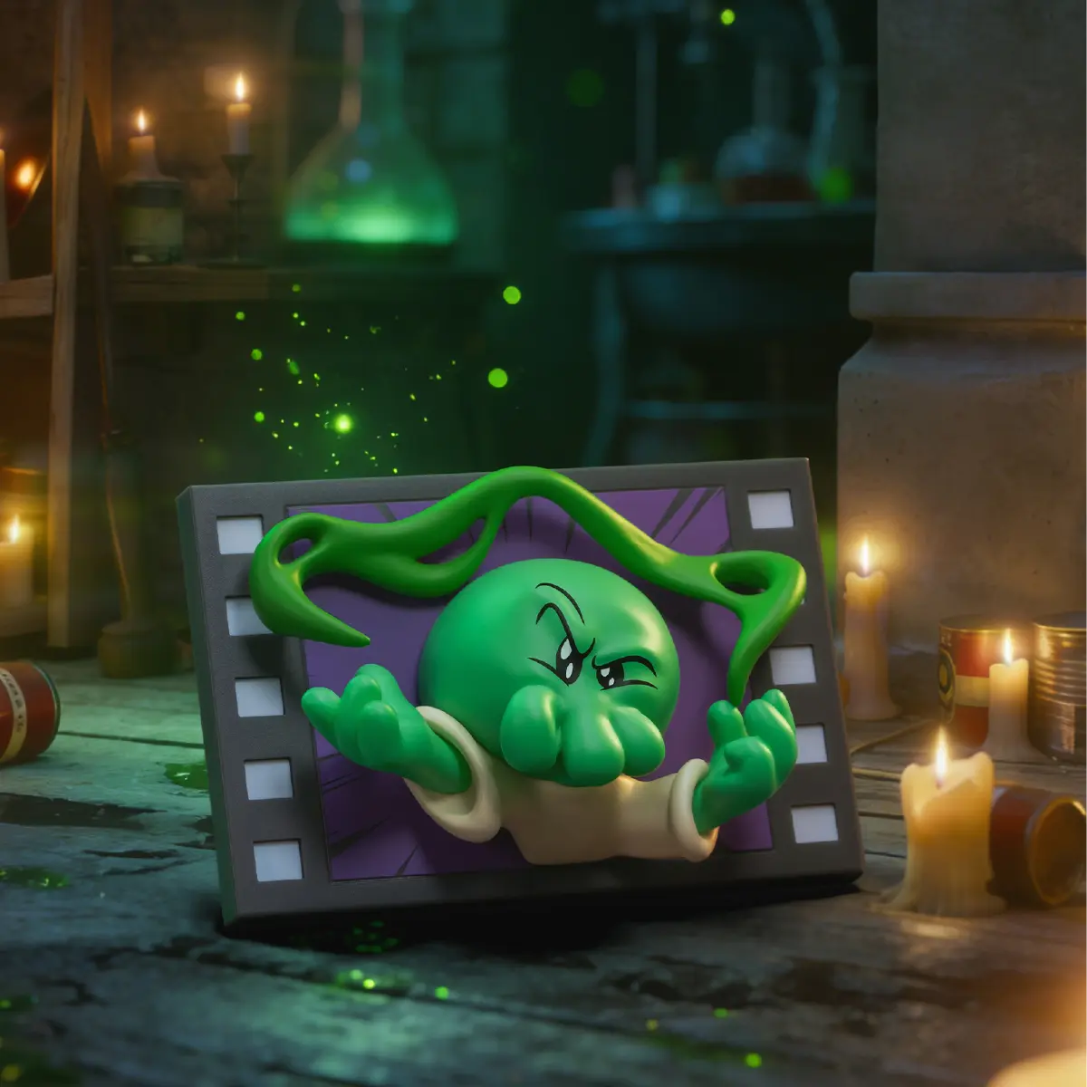 Green Goomi monster fridge magnet breaking through a purple filmstrip frame