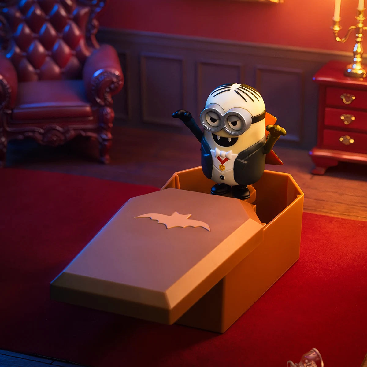 Secret Dave'Acula vampire Minion in a black cape popping out of a bat-emblem coffin, Minion Monsters