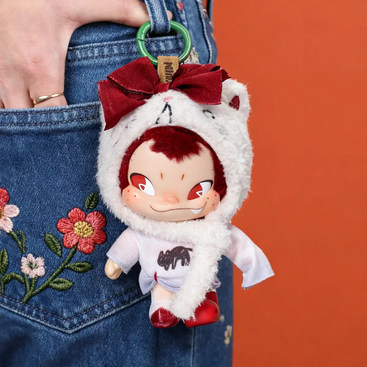 Green NINNIC Wild & Free plush keychain blind box packaging, front view
