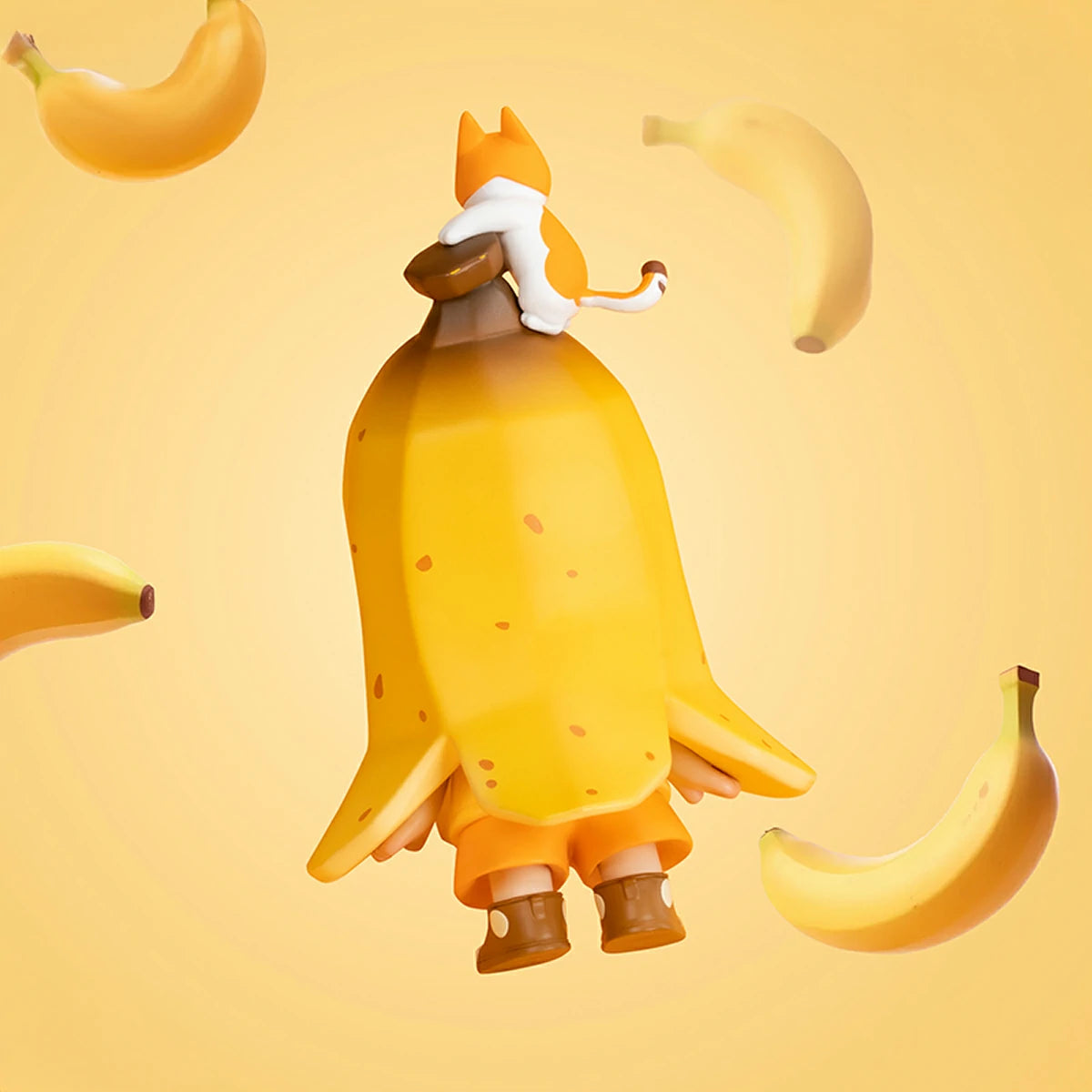 Back view of NOOK Bananana 120% banana-peel figure with perched kitten, limited edition