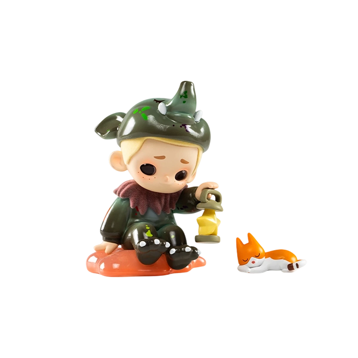 NOOK Dream Eating Tapir figure in a green Baku costume holding a star lamp beside a sleeping corgi