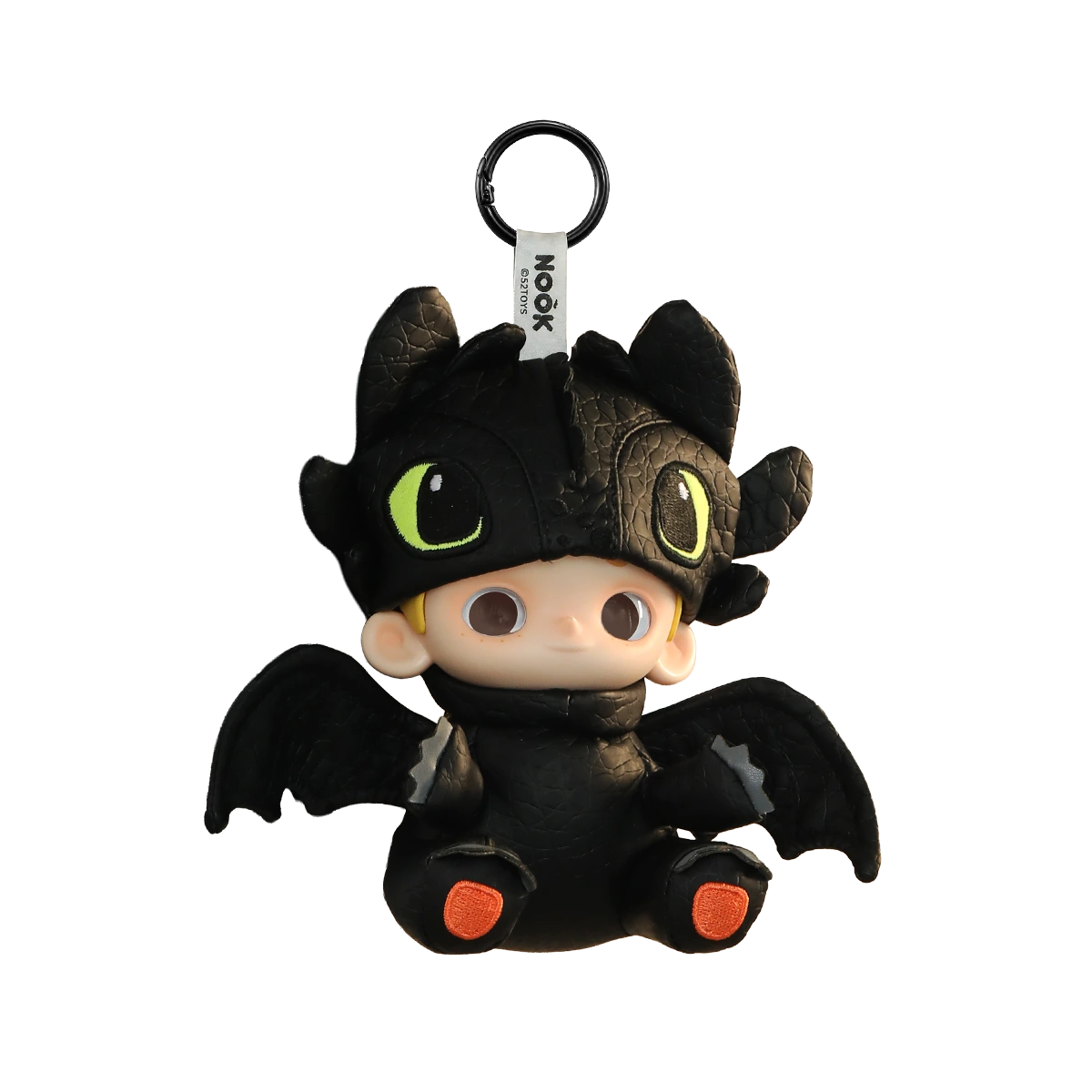 NOOK dressed as Night Fury Toothless in black scaly costume with green eyes, limited edition figure by 52TOYS