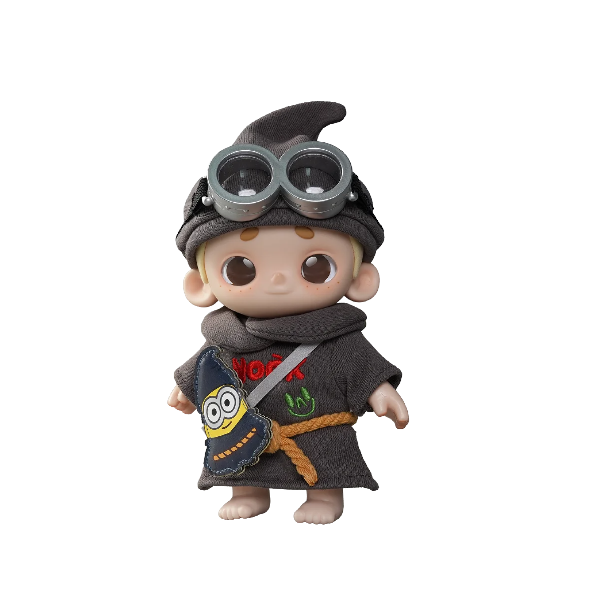 NOOK dressed as Wizard Minion Ed in a dark hooded robe with goggles and Minion bag