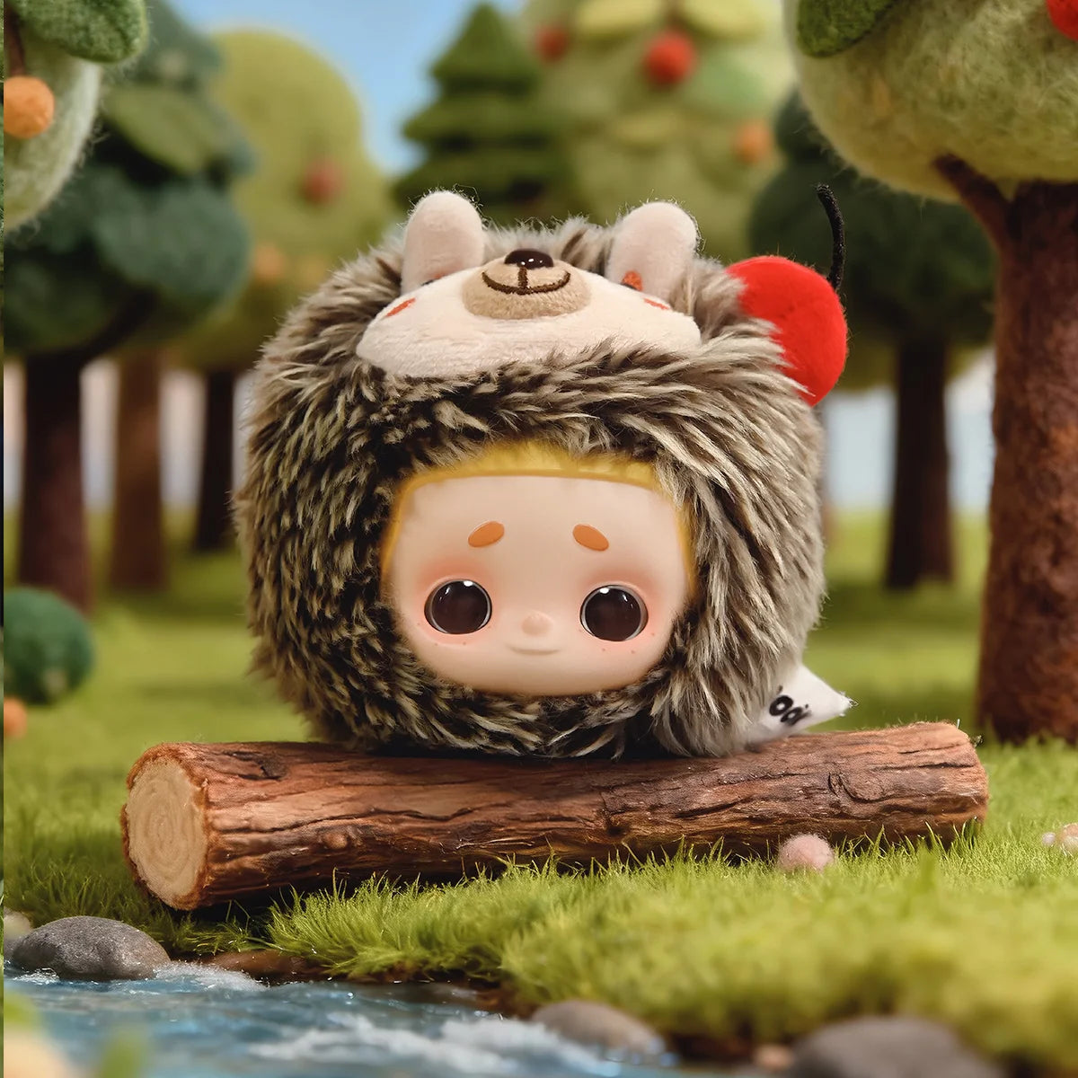 Hedgehog Explorer Nook in a furry brown hedgehog hood with red apple, on a log, My Date with the Forest