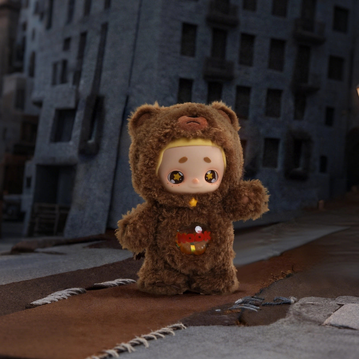 NOOK Star Keeper Bear vinyl plush raising one paw in a dark miniature city
