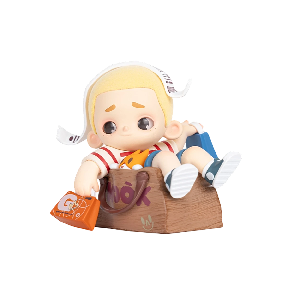 NOOK Super Shopper sitting in a kraft paper bag with receipt and shopping bags, 100% Limited Edition