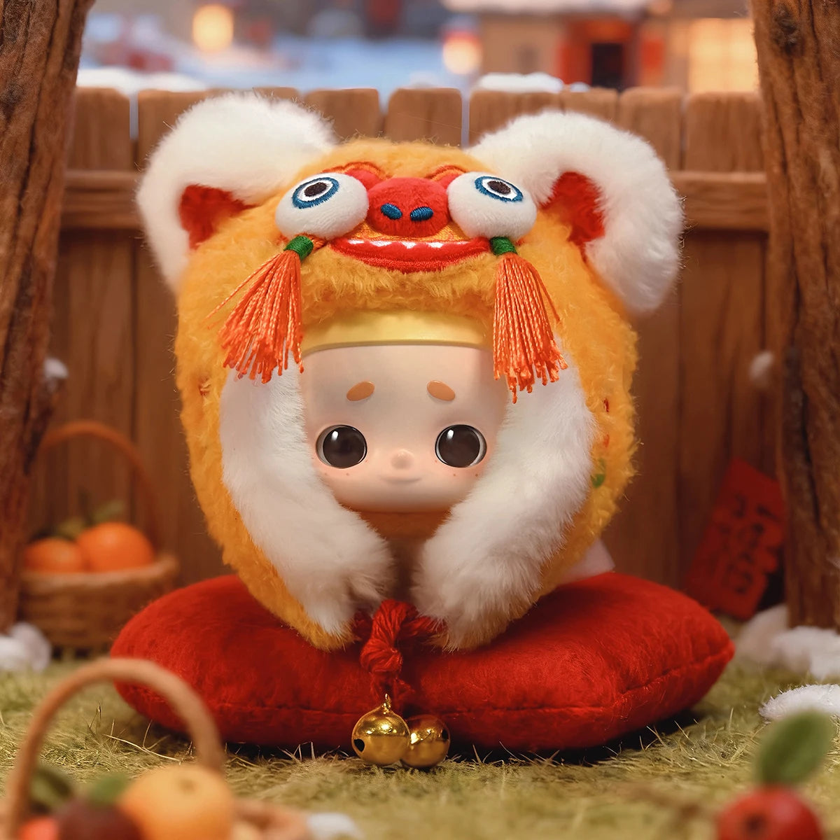 Orange Tiger-Head Hat Nook charm on a red cushion before a wooden fence and oranges