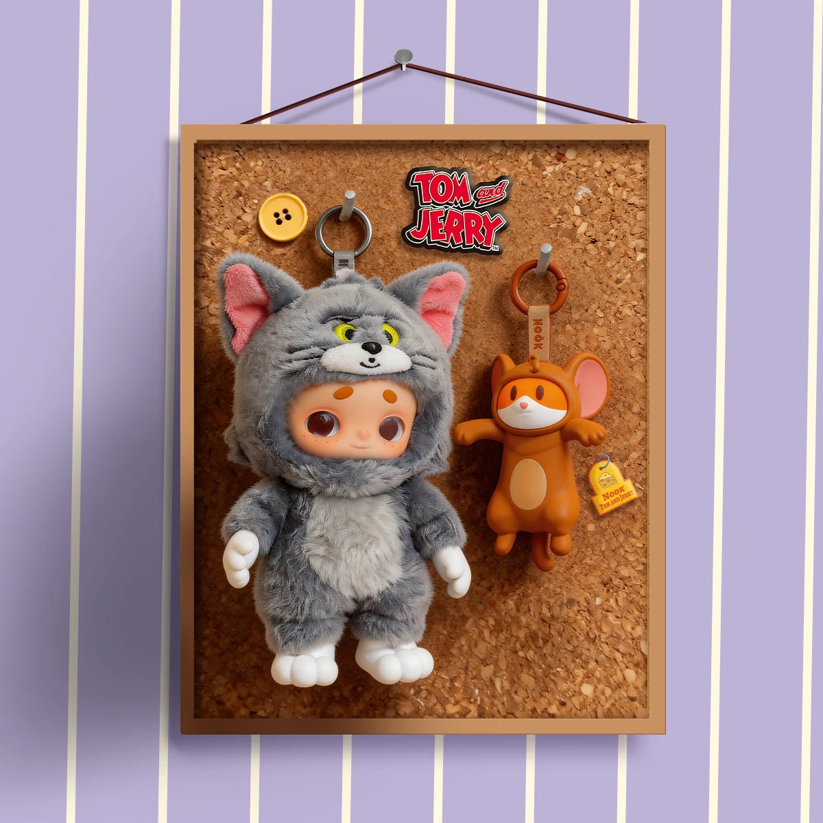 Nook Tom cat plush and Jerry mouse keychain pinned to a cork board, Nook x Tom and Jerry