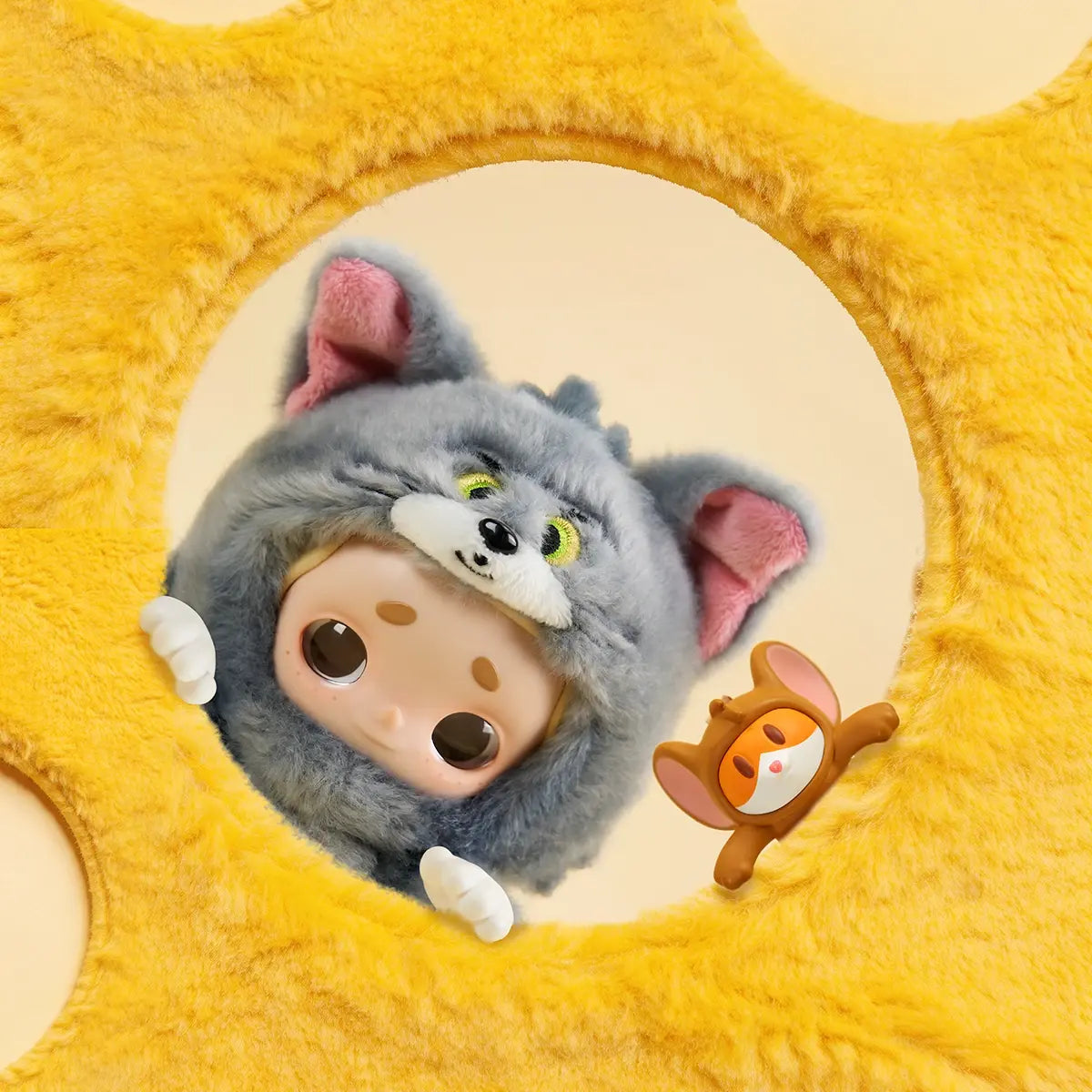 Nook in Tom cat hood peeking through a plush cheese hole beside the Jerry mouse figure, Nook x Tom and Jerry