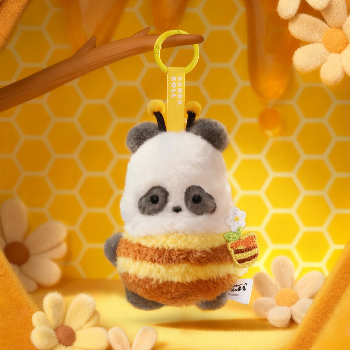 Panda Buzz plush charm in yellow-and-black bee costume holding a honey pot and flower, Panda Roll Happy Weekend