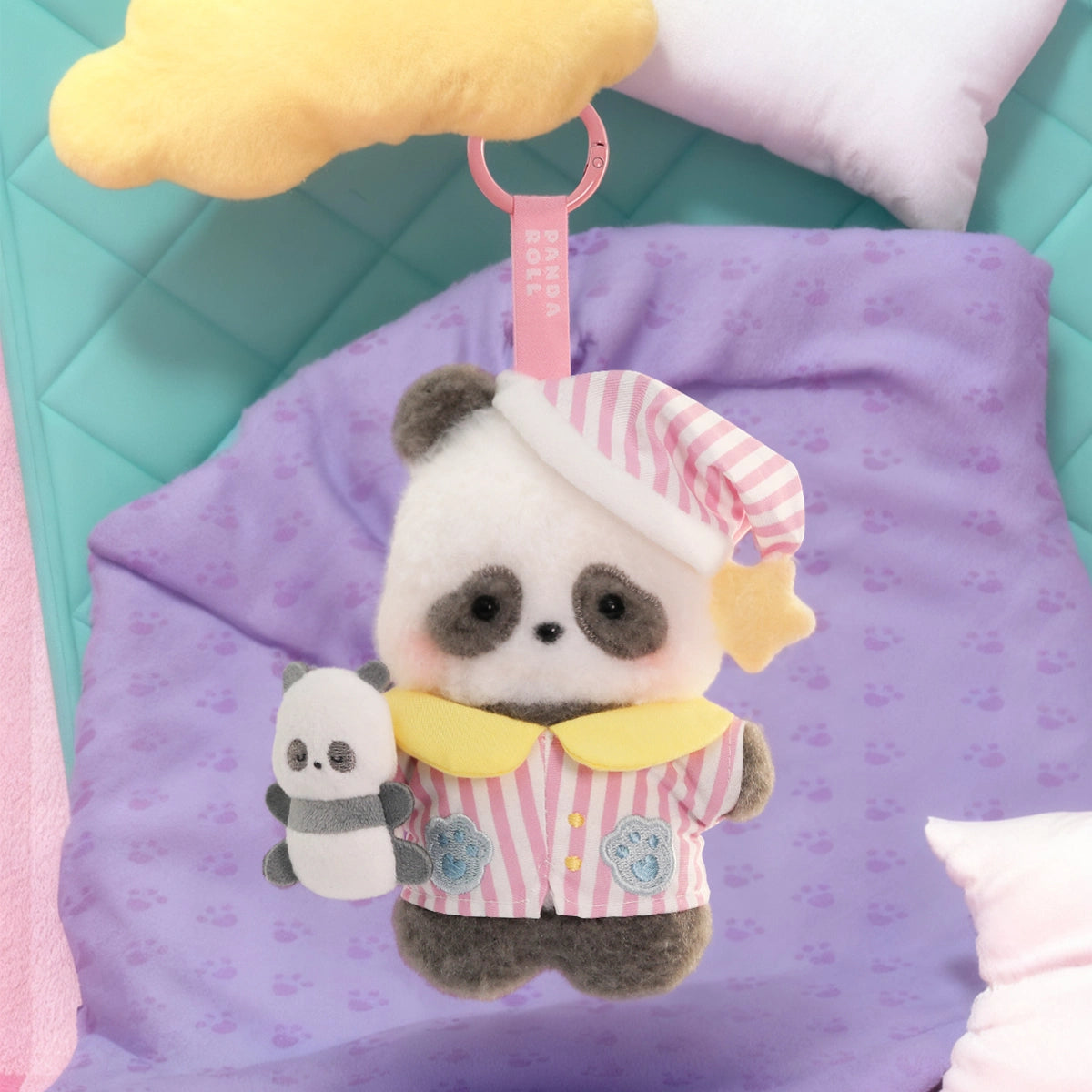 Panda Pajama plush charm in pink-striped pajamas and nightcap cuddling a little panda doll, Panda Roll