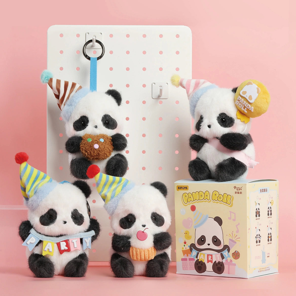 CUPCAKE panda plush keychain in a striped party hat hugging a knitted orange cupcake, Panda Roll Party Series by 52TOYS